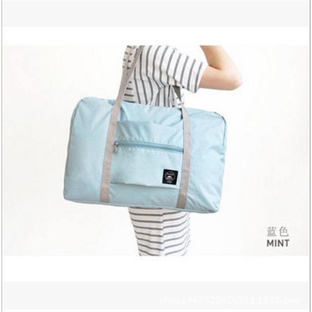 Estilo coreano fresco bolsa de viaje plegable bolsa de almacenamiento de viaje bolsa de jacquard bolsa de organización de ropa
