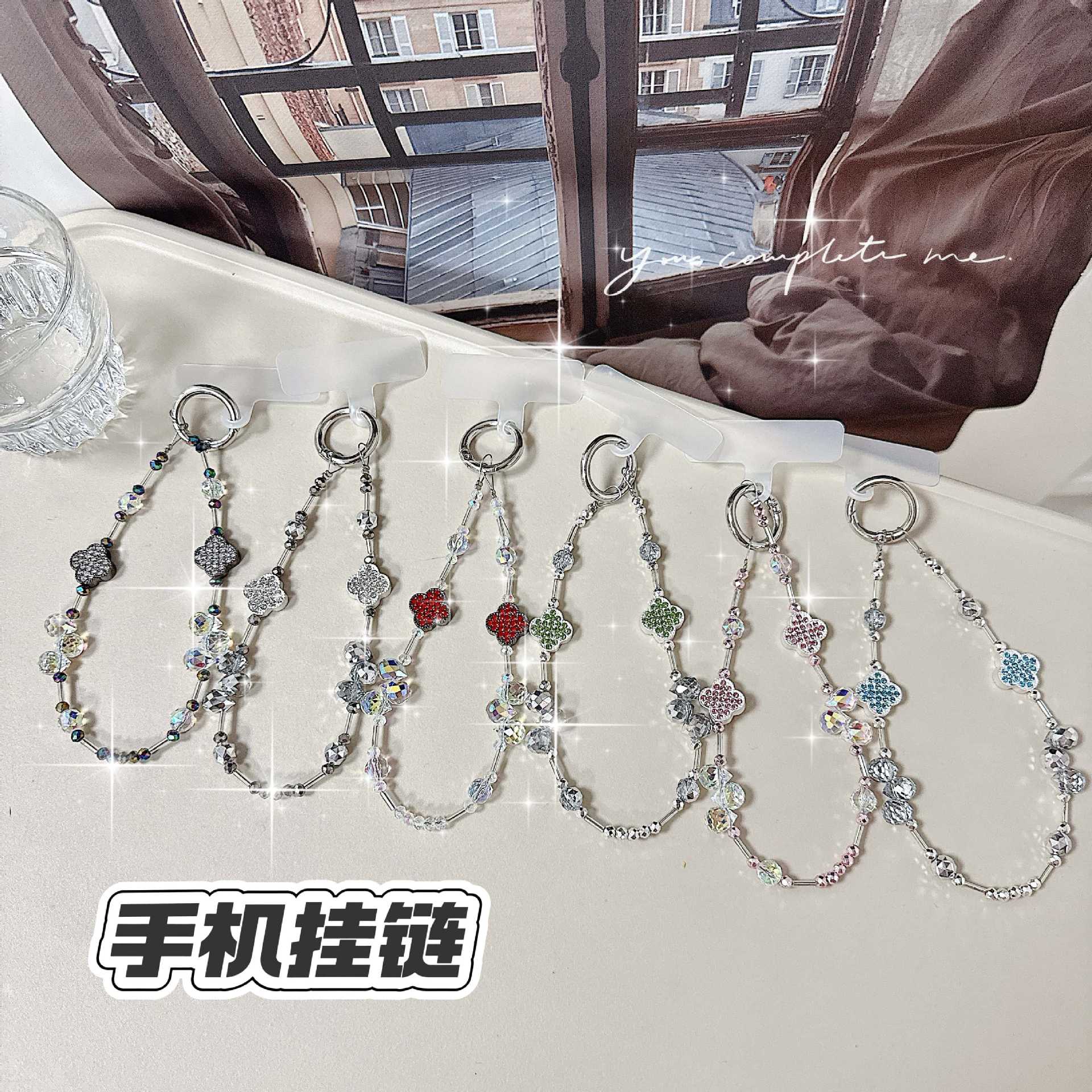 Cadena de teléfono móvil de alta gama hecha a mano boutique, cadena de muñeca de trébol de cuatro hojas de diamantes de lujo femenino, cadena de teléfono móvil de moda, sección corta