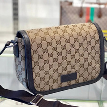 2023春夏新款帆布邮差包简约卡其色老花百搭单肩斜挎马鞍包女士包