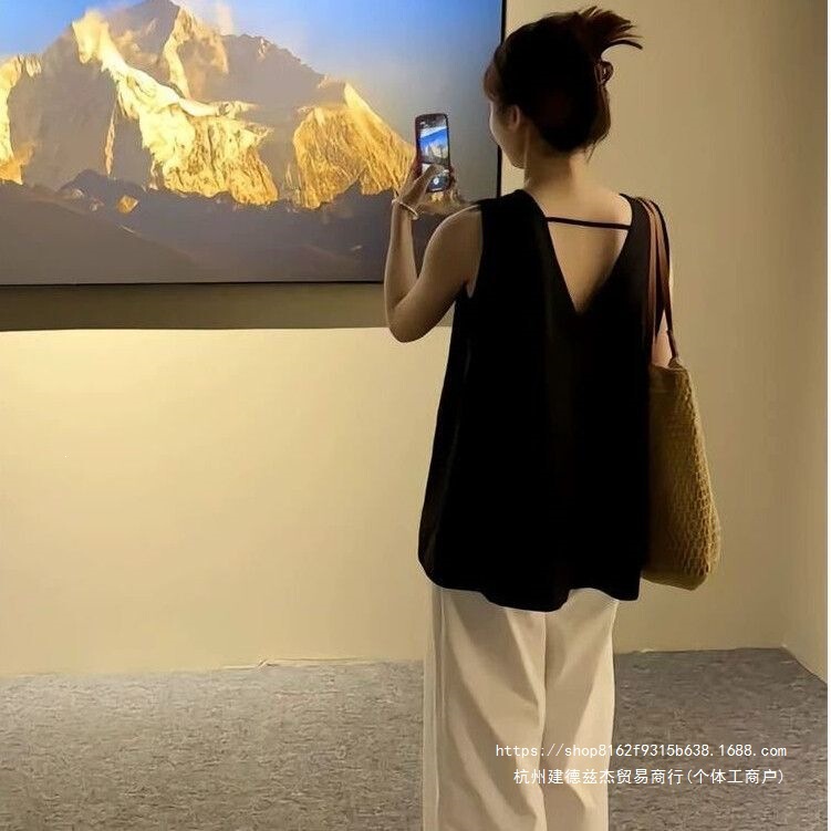 French-style niche black sleeveless shirt with hollow back design, loose and casual style, women's tank top babydoll top