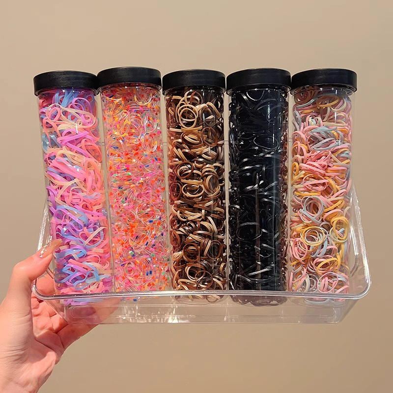 Cuerda para la cabeza con lazo para el cabello con cola de caballo para niños pequeños 2025 nueva banda de goma desechable para bebés cuerda para el cabello con funda de cuero pequeña duradera