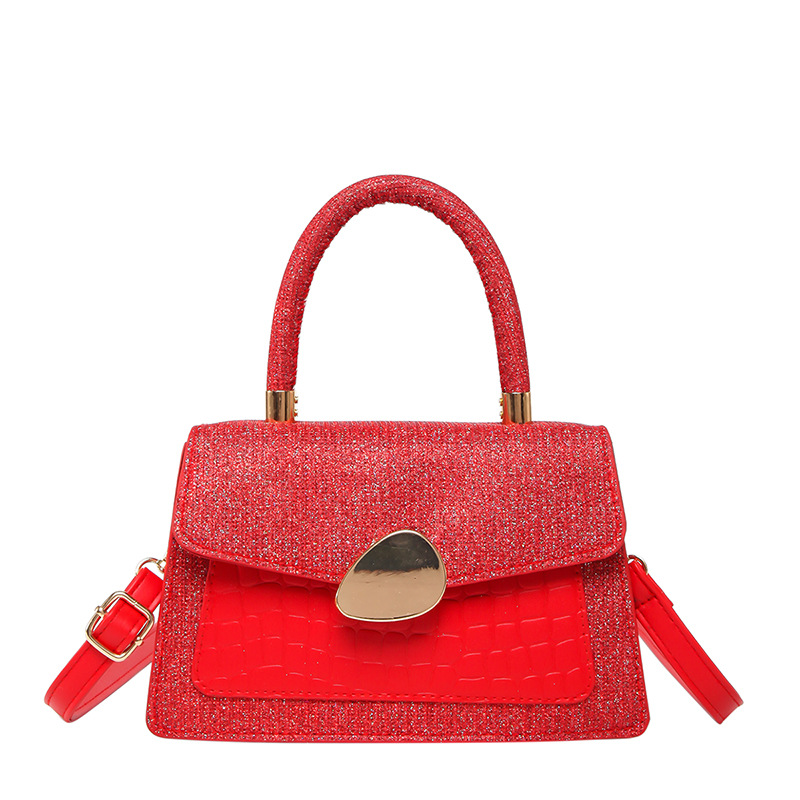 Hong Kong retro caramelo bolso de mujer 2025 moda nueva mochila de moda estilo extranjero cocodrilo empalme bolso pequeño