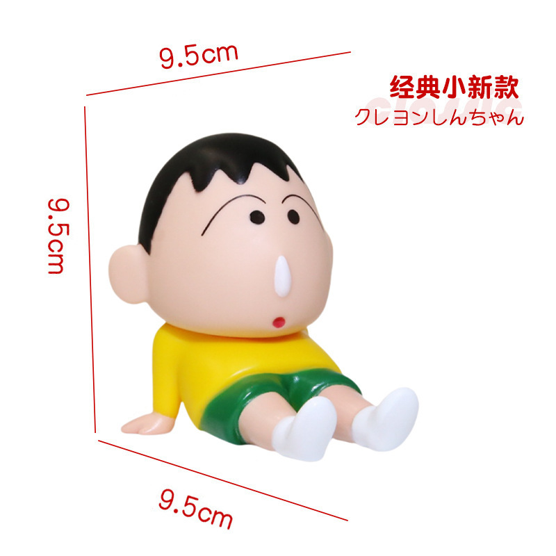 アニメのクレヨンの小さい新しい携帯電話のタブレットのスタンドの子供の頃の怠け者のネットの赤いアニメの手は湿ってかわいい子供の置物を遊びます。|undefined