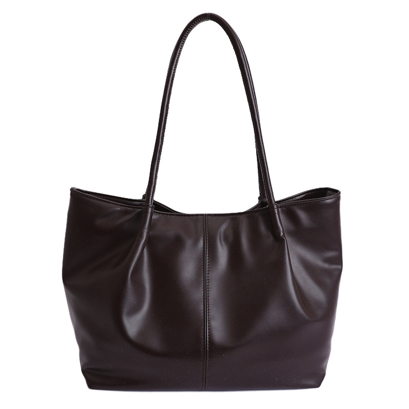 Bolso 2026 nuevo retro bolso de hombro de transporte de gran capacidad bolso de mujer simple y versátil bolso de brazo portátil