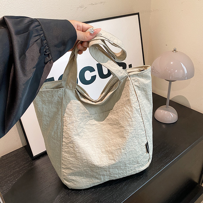 Casual japonés nylon impermeable ocio color sólido simple de gran capacidad para estudiantes de clase de viaje de hombro mochila