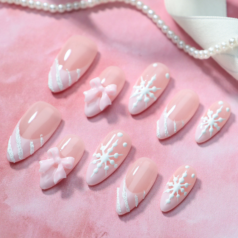Hot-Selling Handmade Nail Art with Exquisite Hand-Painted 3D Snowflakes and Bows, Elegant Girly Pink French-Style New Year Manicure