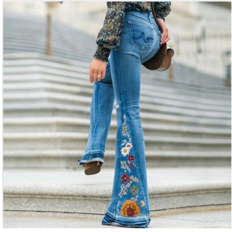 Dames flared jeans van geborduurde denim met medium taillehoogte_voghion.com