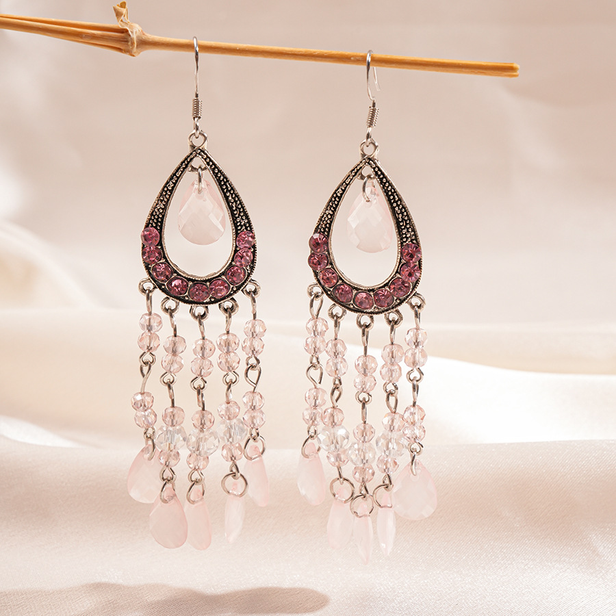 Europa y los Estados Unidos con diamantes de vidrio hueco en forma de gota de agua gancho de orejas bordado estilo nacional retro lujo ligero nicho de alta calidad pendientes para mujeres