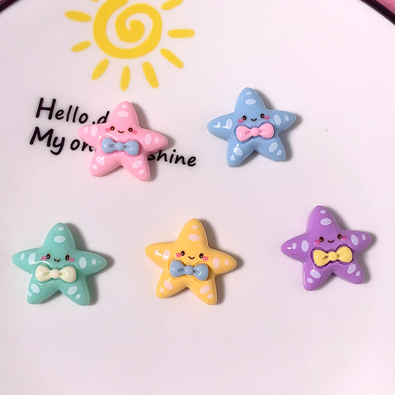 Cartoon brillante corbata estrella de mar material DIY accesorios de resina pegamento crema caja de teléfono móvil material clip de pelo parche de taza de agua