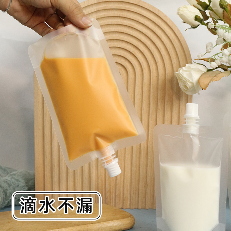 Soy milk bag disposable traditional Chinese medicine liquid packaging bag juice drink transparent self-standing yogurt sealed bag spout bag