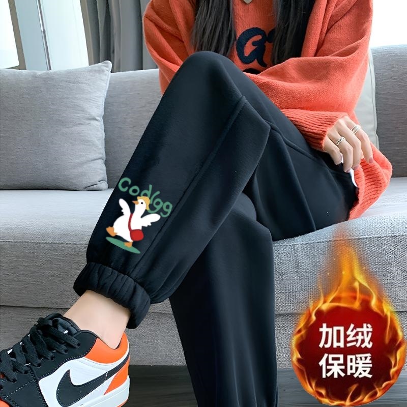 흰색 거위 레깅스와 벨벳이 달린 검은색 바지