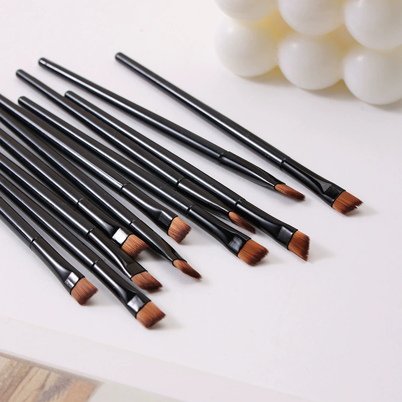 Makeup Brush handheld black, plastic handle, angled small brush for primer and eyeliner