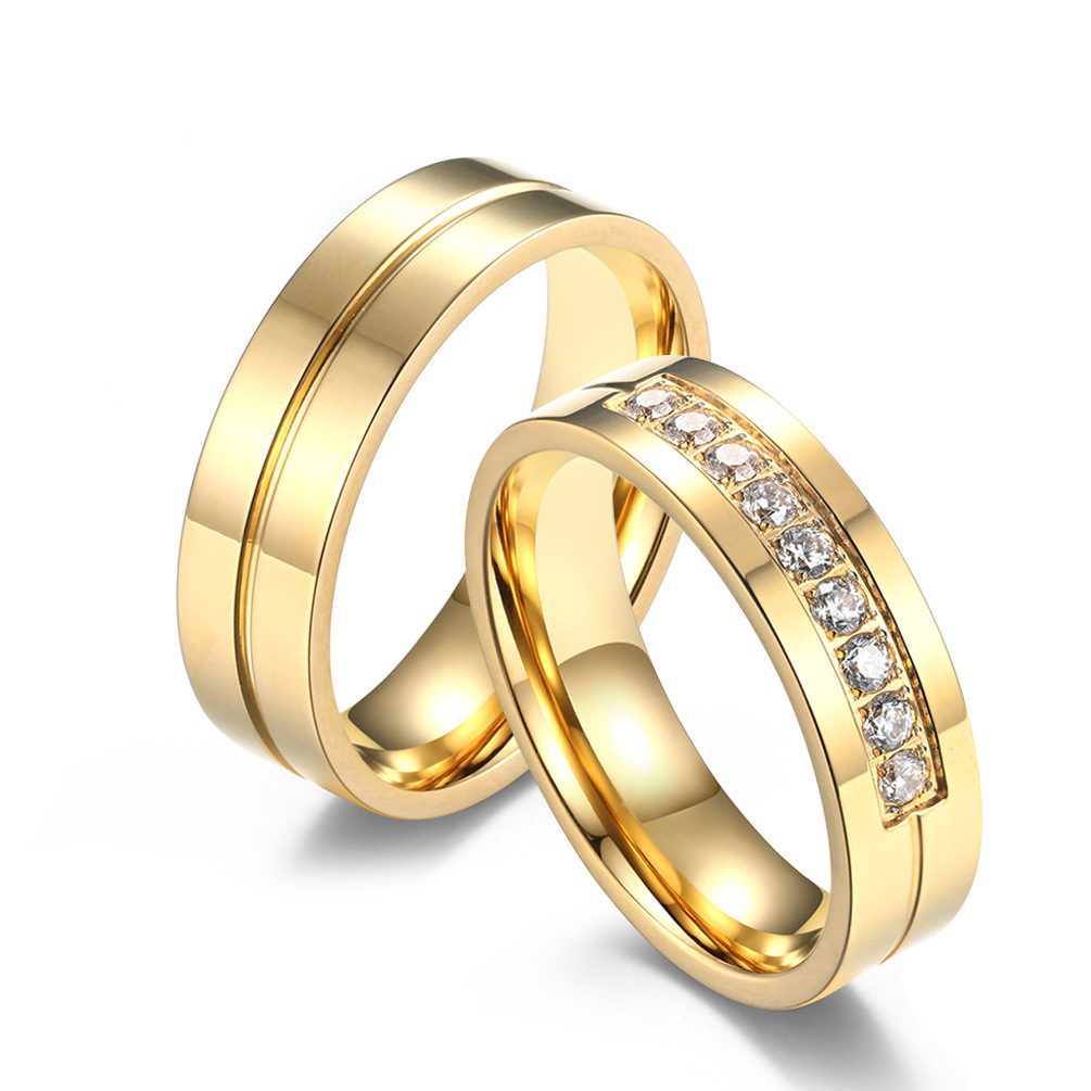Anillos de pareja con incrustaciones de diamantes de acero de titanio, los más vendidos en Europa y América, anillos de compromiso y propuesta sencillos y lisos chapados en oro, joyería de mano que no se desvanece.