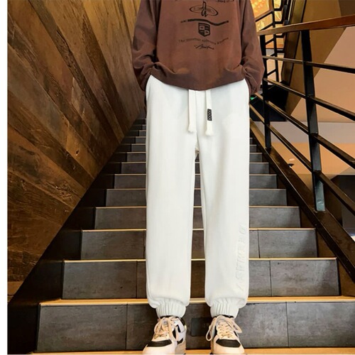 Steel-stamped letter-printed ankle-banded sweatpants for men—autumn/winter loose-fitting, wide-leg casual pants; pineapple-patterned sports pants in Japanese style.