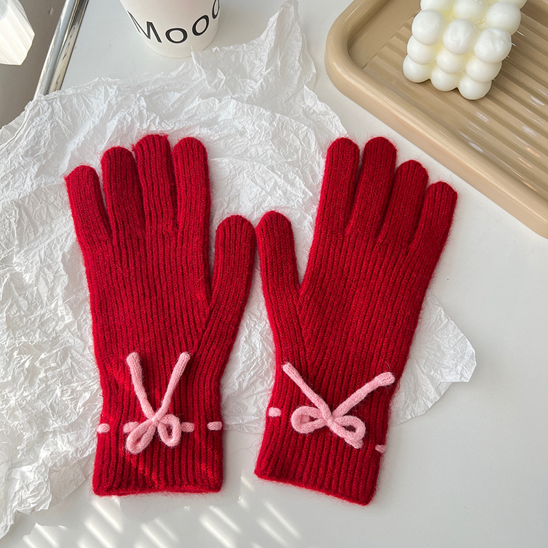 Otoño y invierno nuevo color sólido lindo arco coreano dulce dedo táctil guantes calientes al por mayor para estudiantes