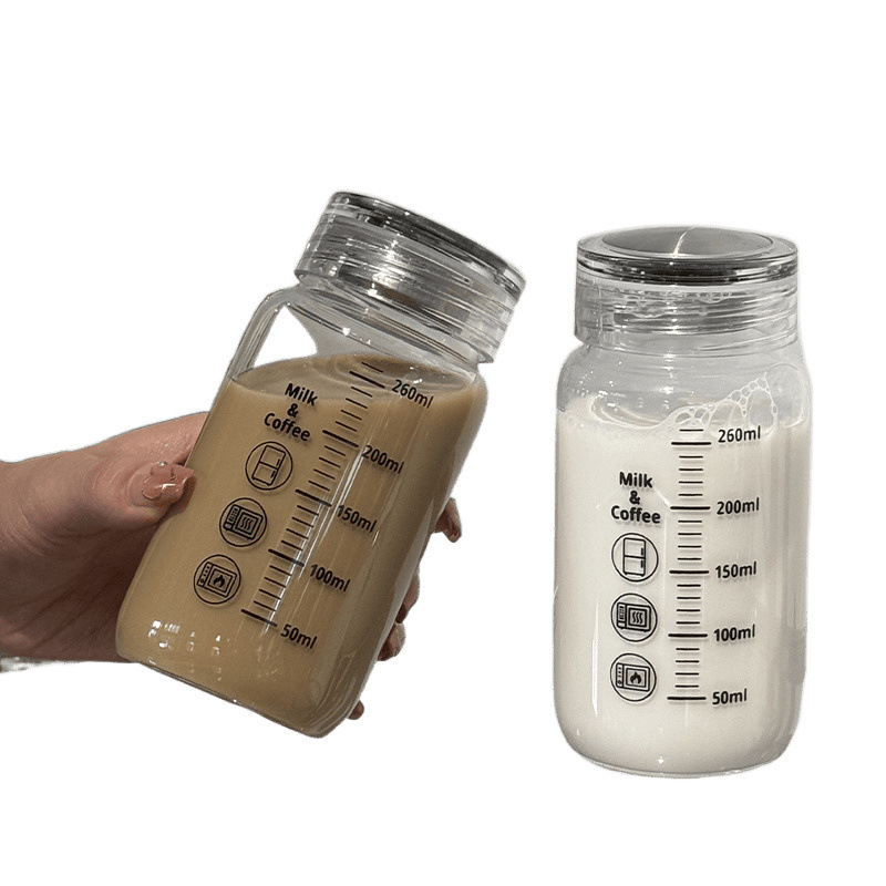 耐高温牛乳カップ蓋付き子供目盛カップ朝食に哺乳瓶を飲みます。|undefined