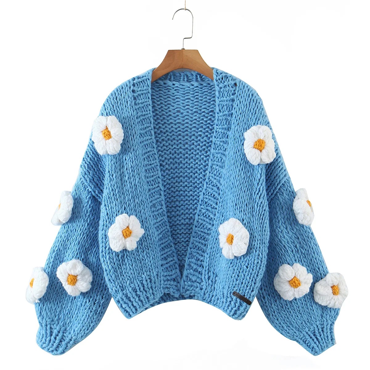 Abrigo de suéter para mujer 2021 Otoño e Invierno Nuevo estilo perezoso europeo y americano patrón tridimensional hilo grueso ganchillo abrigo hecho a mano de cintura alta