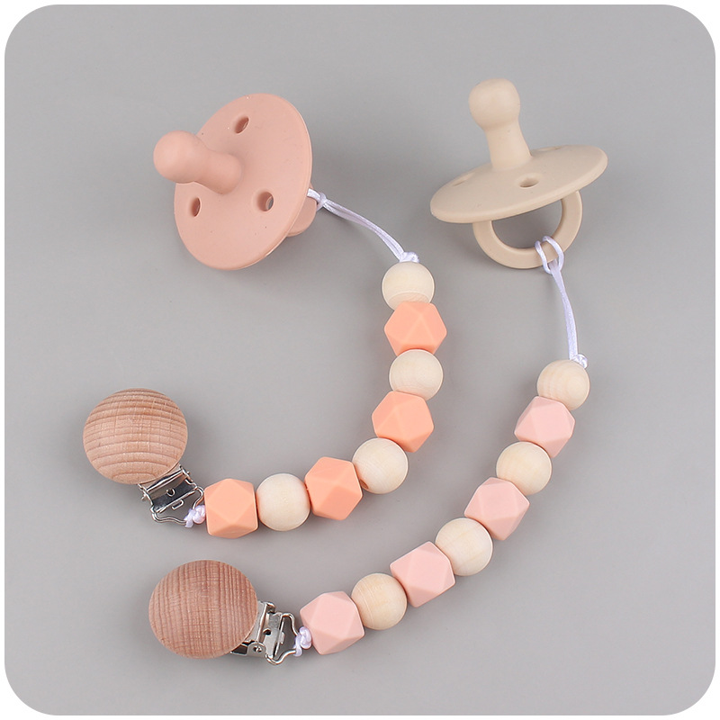 Nuevos suministros para bebés de silicona octogonal Cadena de chupete calmante bebé cuentas de silicona mordedura molar cadena anti-caída