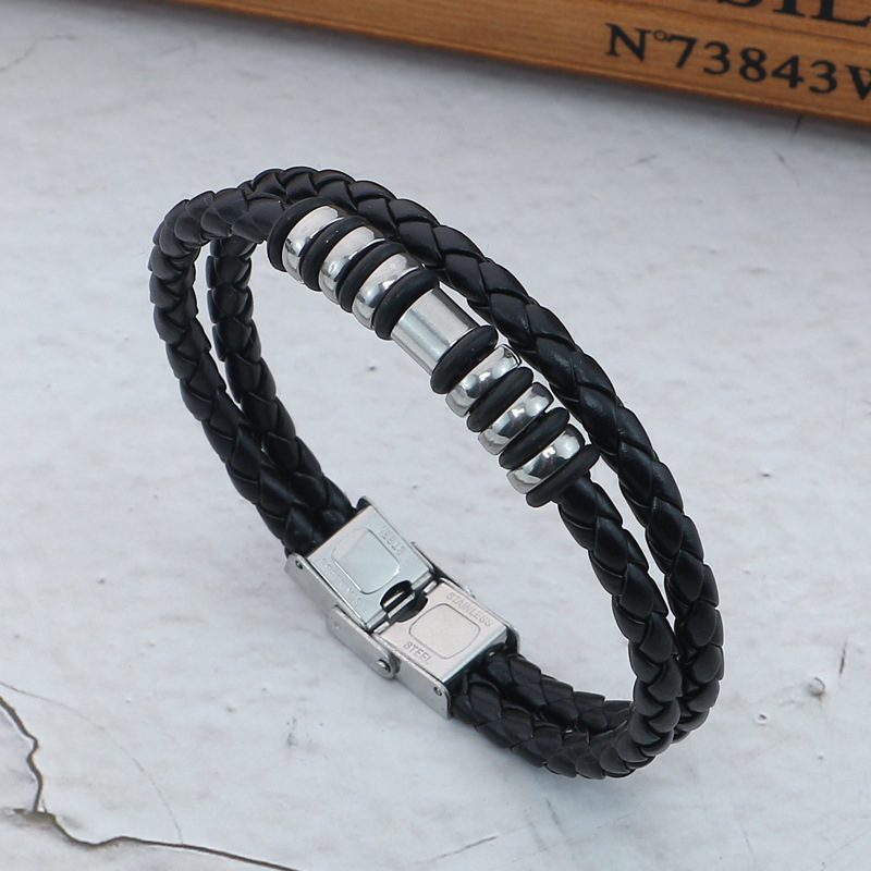 Factory direct supply stainless steel bracelet cross-border supply Europe and the United States leather woven men's titanium steel bracelet a generation of hair