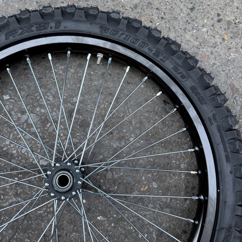 QiuLong LightBee modified front 1.6-21inch front wheel assembly with Yousheng 7-series aluminum alloy rims and Newmax tires