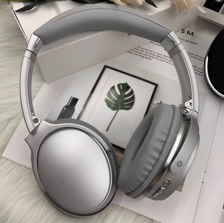 Versión de alta gama QC35 II transfronteriza con bolsa de cuero auricular Bluetooth inalámbrico enchufe palabras de dibujos animados en el extranjero