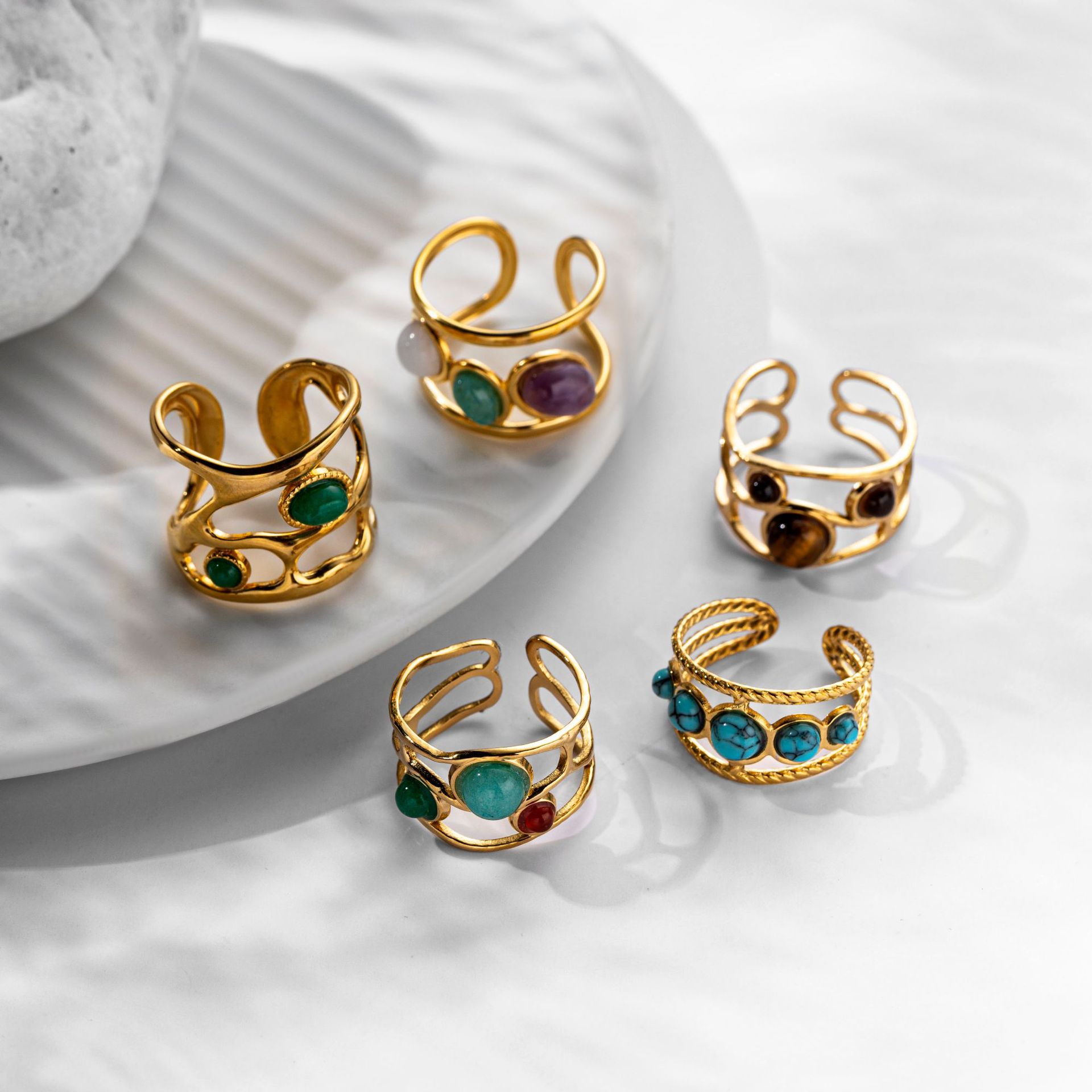 Taena Europa y América 18k oro alto color acero inoxidable anillo diseño de nicho viento de piedra natural transfronteriza anillo