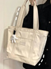 Japanese shoulder bag for leisure, capacious shopping bag, one-shoulder bag, 2023 collection