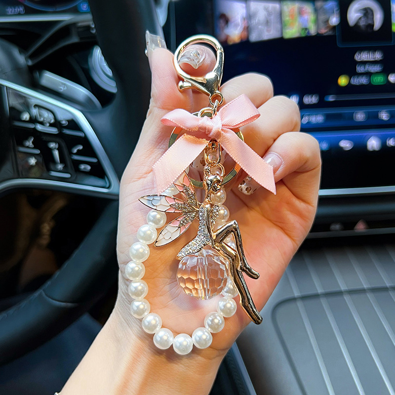 Nueva cadena de perlas arco de aleación de ángel llavero de estilo coreano llavero de automóviles bolsa de chicas colgante