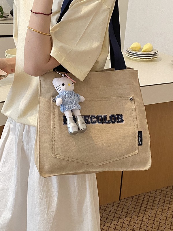 Bolso de lona para mujeres 2026 nuevo bolso de mano casual fuerte de gran capacidad textura alta bolso de viaje coreano