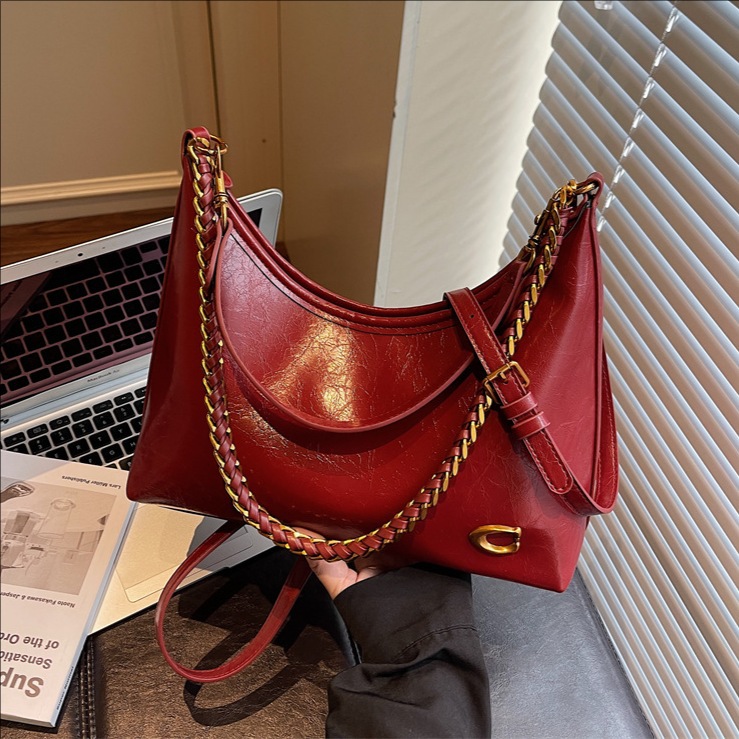 Bolso de mano transfronterizo de alta calidad, bolso de brazo brillante para mujeres, otoño y invierno 2025, nuevo tipo de bolso de hombro de cadena, bolso de moda.