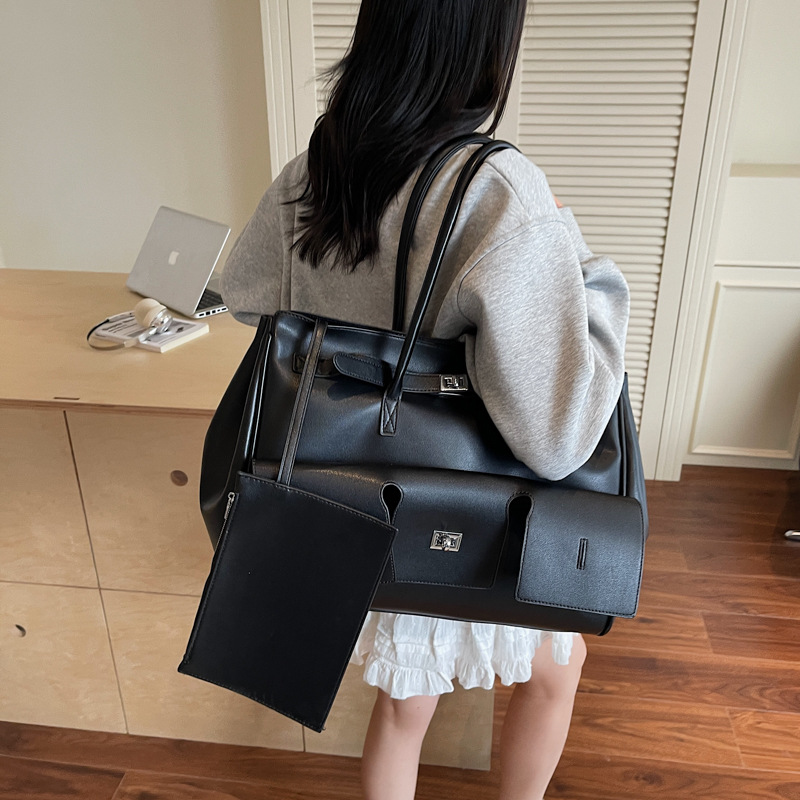 Bolso de viaje portátil retro explosivo transfronterizo 2025 nuevo maletín casual versátil bolso de alta gama de un solo hombro