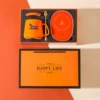 Hermès orange suit