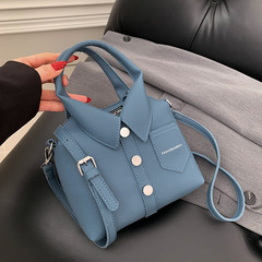 ファッションの個性的な新しい服のカバンはファッション的でシンプルです。