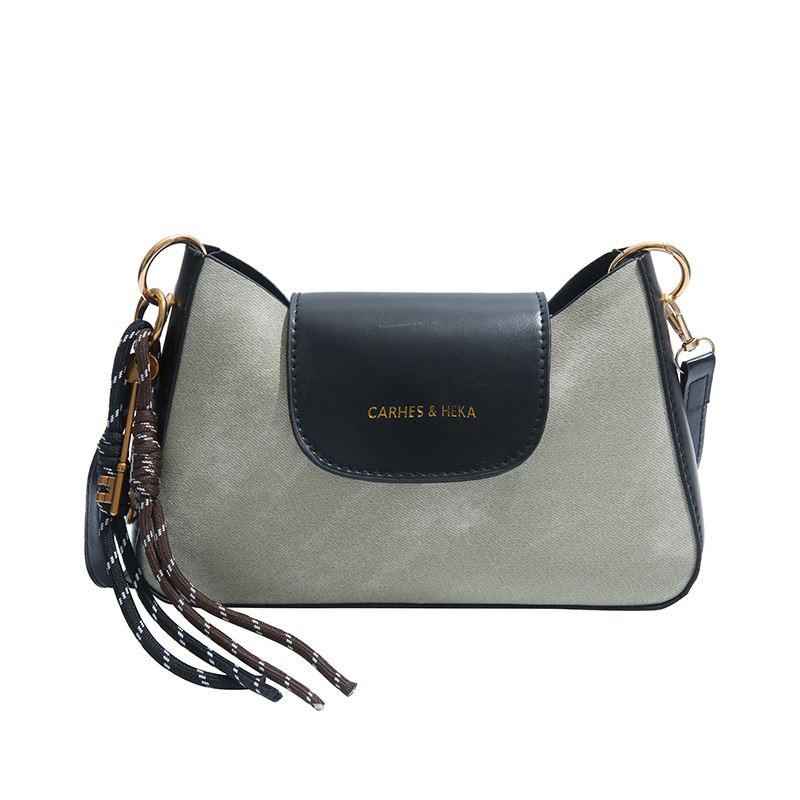 Textura de mujer mochila casual 2025, nuevo paquete de hombro de moda de primavera coreana simple empalme bolso debajo de la axila