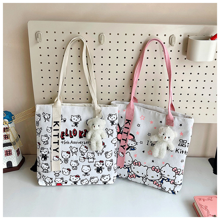 The new fashionable cartoon canvas bag, simple and versatile tote bag, cute commuting single-shoulder tote large bag, is selling well across borders undefined