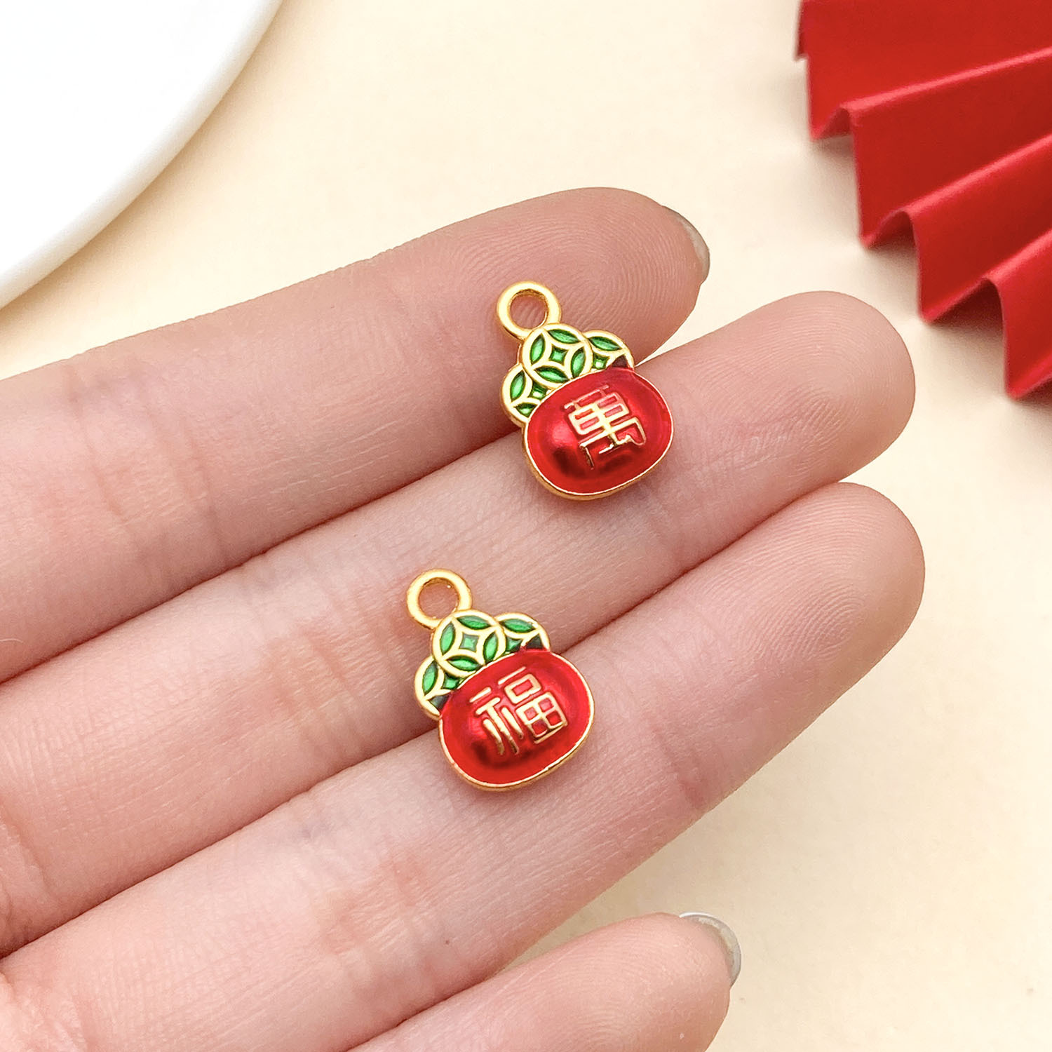 22798-ZY2-红绿色滴油亮金锌合金万福铜钱福袋钱袋15