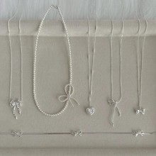 S925纯银珍珠蝴蝶结项链女秋冬新款不掉色女高级感小众百搭毛衣链