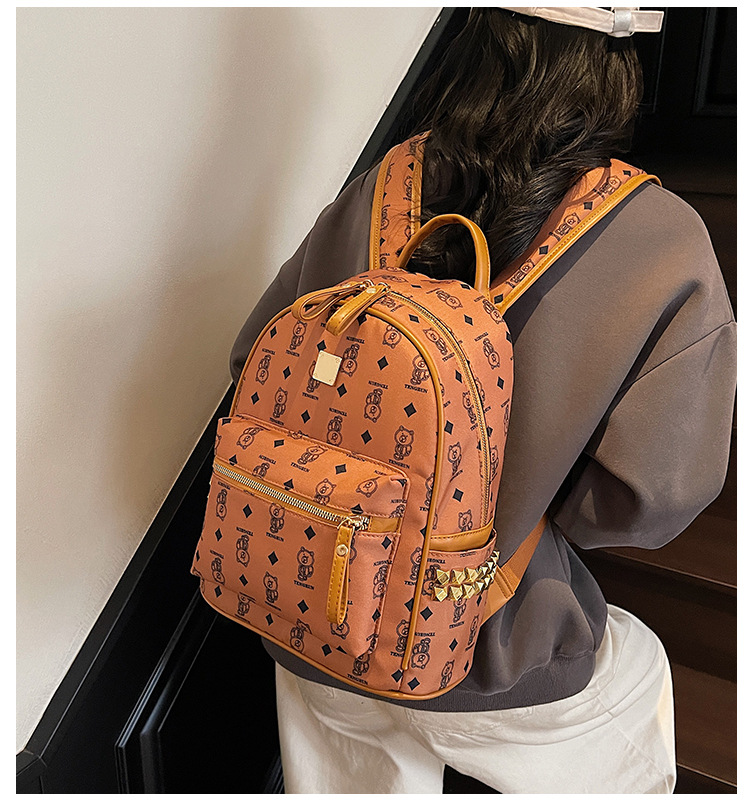 A cute little bear backpack for female college students in 2025, a new fashionable and trendy backpack with a large capacity full figure