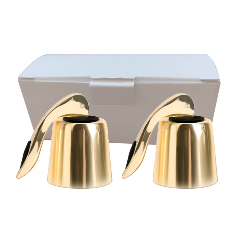 후드가 있는 금색 완전 플라스틱 손잡이 플러그 2개가 상자에 들어 있습니다.