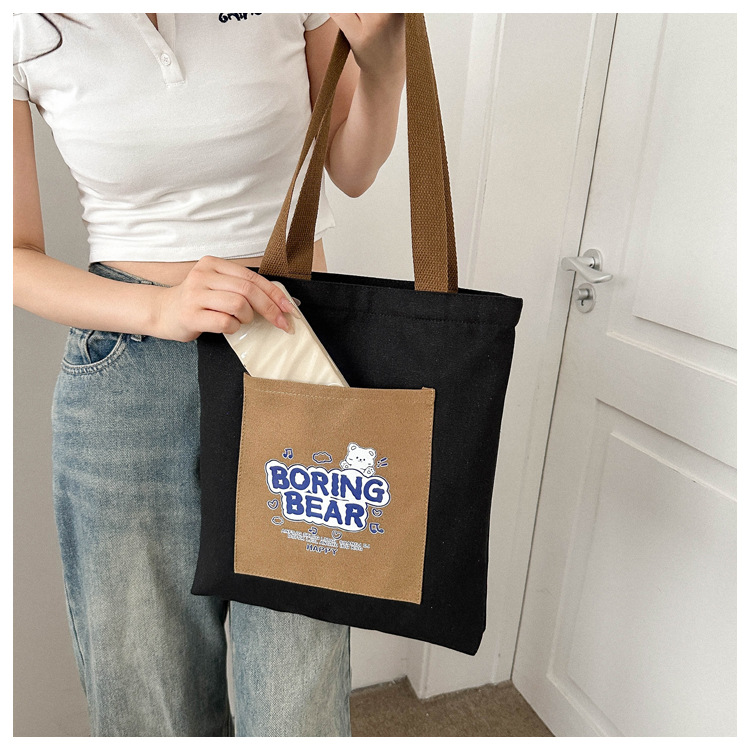 Wholesale of 2025 new casual and fashionable canvas bags, large-capacity single-shoulder bags for college students' shopping, and trendy tote bags undefined