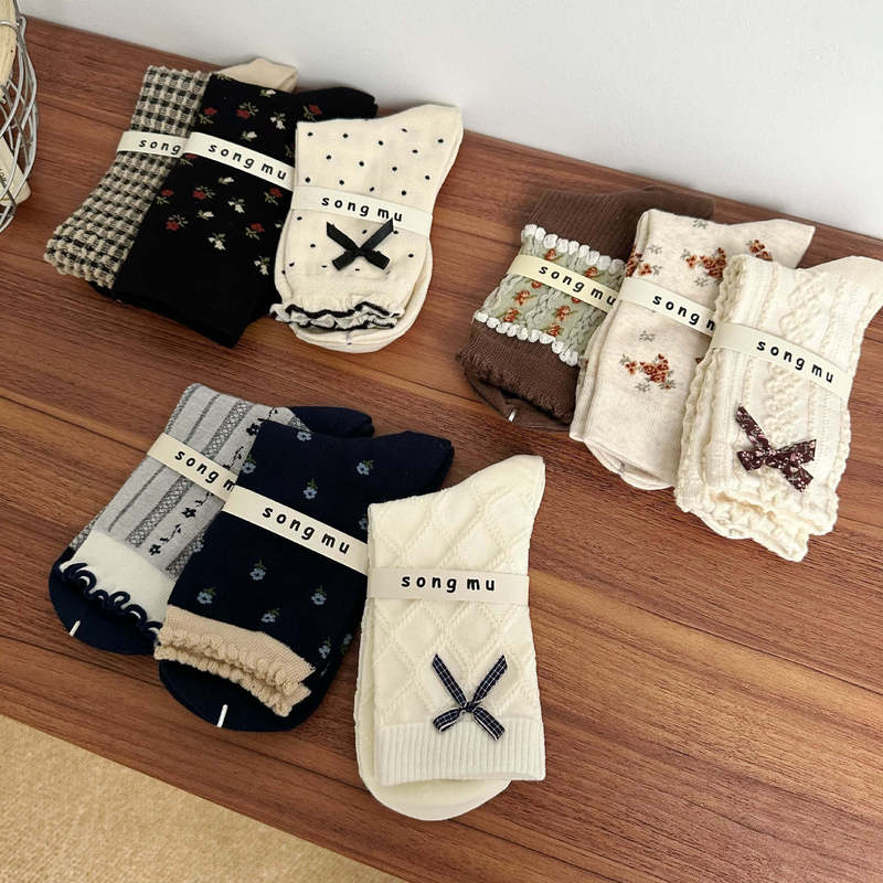 Songmu designer "bow socks women's tube socks autumn and winter new niche original Korean version of pile socks