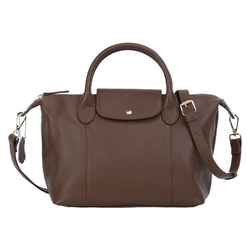 Nueva primera capa de piel de vaca de cuero de las mujeres de gran capacidad textura portátil simple todo-Partido de fábrica al por mayor bolsa de Boston