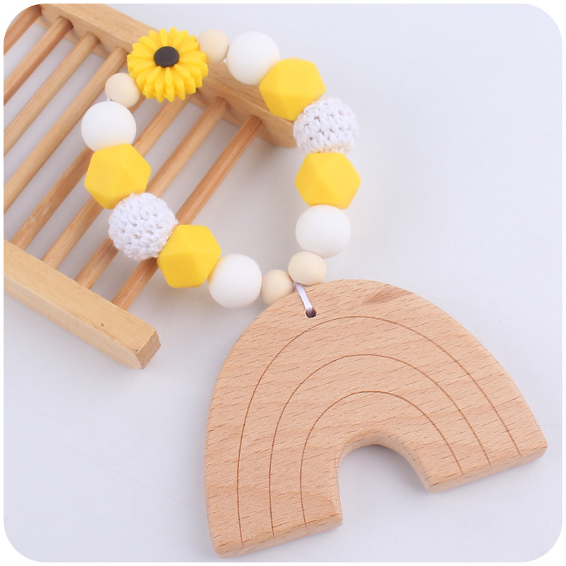 Nuevo bebé suministros dibujos animados Arco Iris haya mordedor creativo DIY bebé mordedura teether pulsera juguete