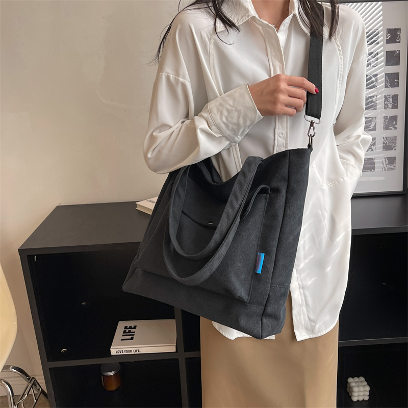 Los fabricantes venden al por mayor el nuevo bolso Tote para mujer bolso de lona de color sólido de gran capacidad bolso de mensajero de hombro casual de moda simple