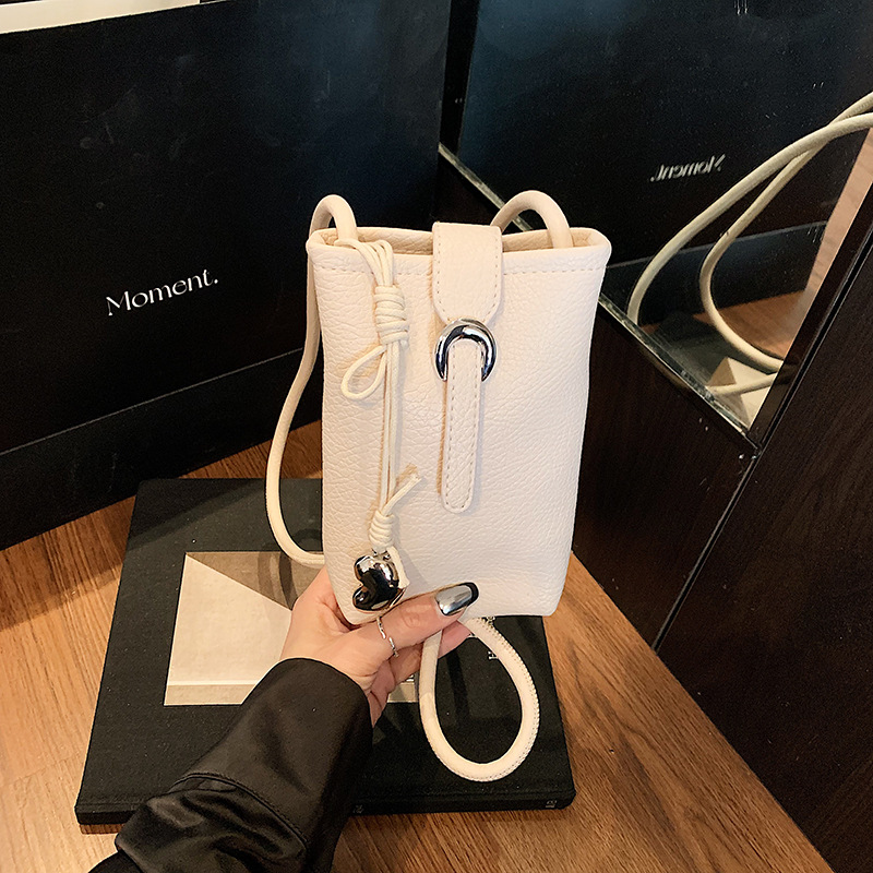 Bolso de teléfono móvil de moda coreana 2025 verano nuevo bolso femenino bolso de hombro popular de este año bolso de mensajero con patrón de lichi simple