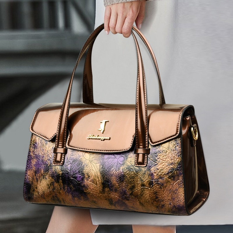 Luz lujosa 2024 nueva moda nueva bolsa china de cuero brillante de gran capacidad bolso de hombro bolso de almohada una bolsa de cabello