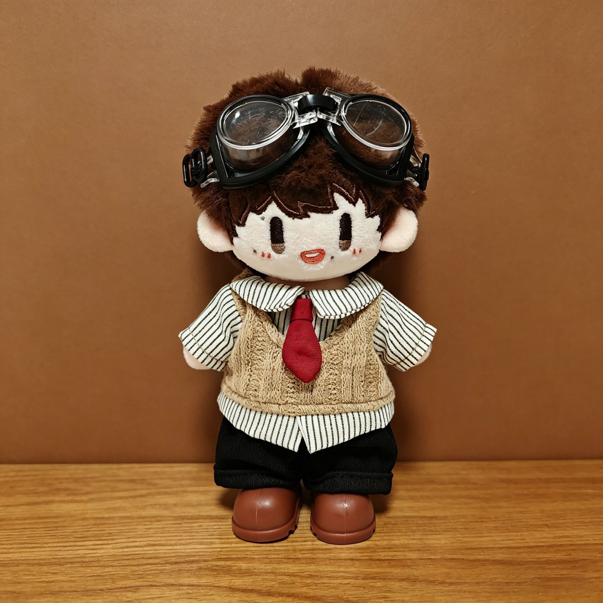 British shirt + black pants + brown shoes + goggles