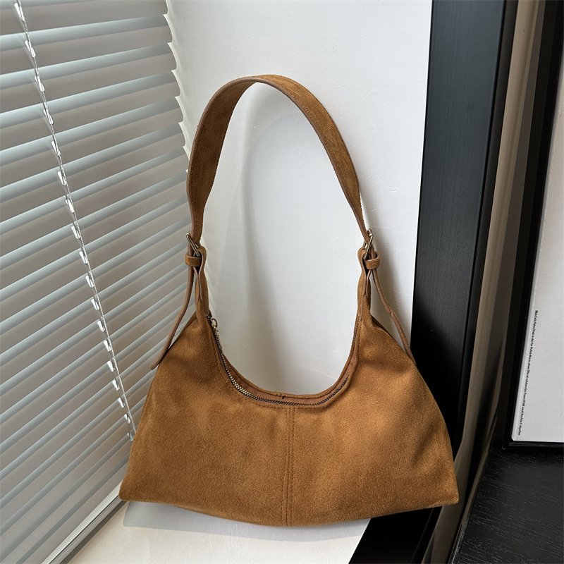 Bolsa coreana de seda texturizada 2024, nuevo nicho de diseño, bolso de palo, bolso de hombro retro de cuero pu.