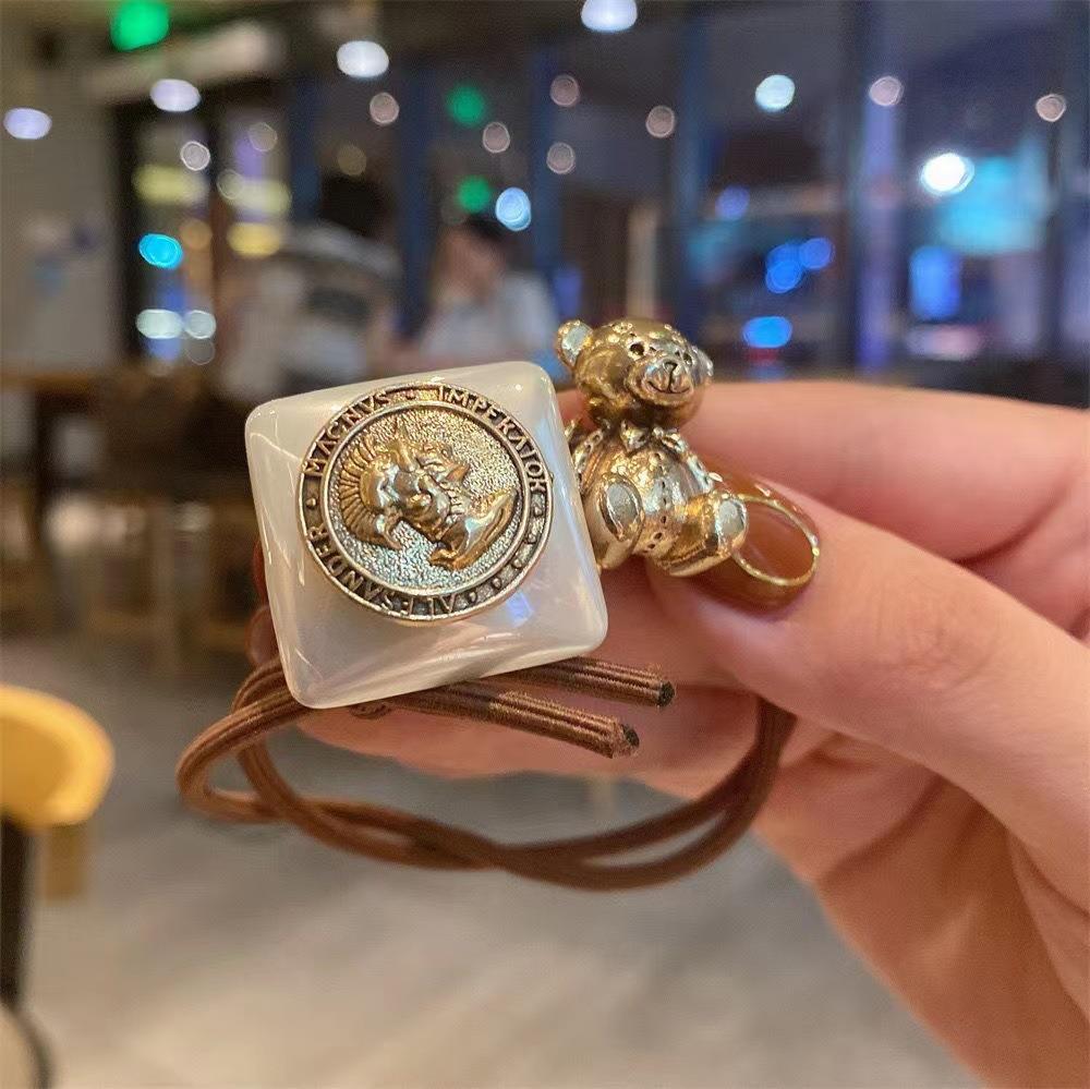 Elástico joyas de cabello de moda con frijoles frescos M anillo de cereza cuerda de cabello al por mayor de la banda de goma cabeza de 100 bolas de cabello rojo una variedad de alta elástica