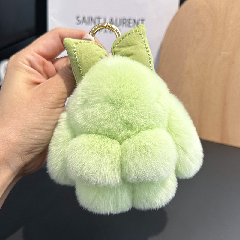 卸売りのかわいいウサギの毛の蝶結びの小さいウサギの自動車のキーホルダーはぬいぐるみのかばんを掛けて飾ります。